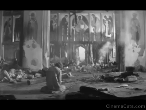 Andrei Rublev - black cat in foreground looking at devastation in church and Andrei Anatoliy Solonitsyn animated gif