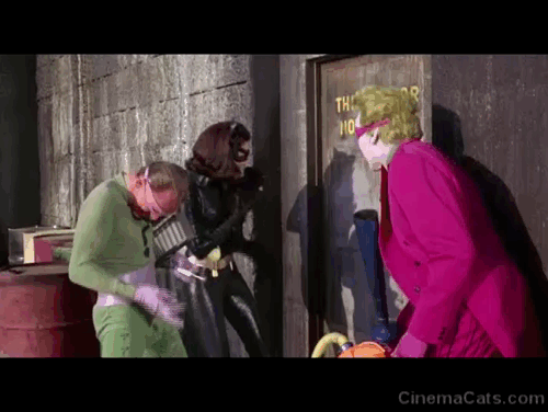 Batman the Movie - Catwoman Lee Meriwether releasing black cat Hecate with Joker Cesar Romero and Riddler Frank Gorshin outside door animated gif