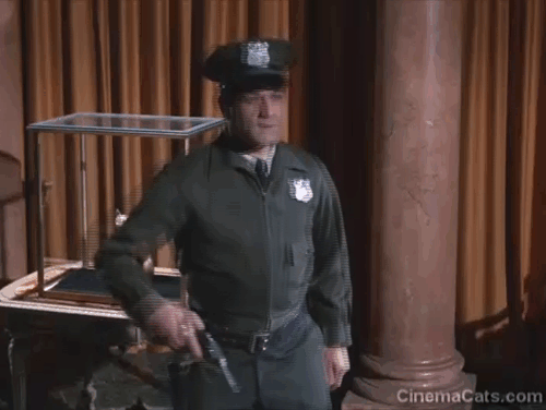 Batman - The Purr-fect Crime - guard attacked by black cat and knocked down animated gif