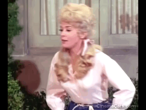 The Beverly Hillbillies - Elly the Working Girl - Elly Mae Donna Douglas and Miss Hathaway Nancy Kulp watching critters on merry go round animated gif