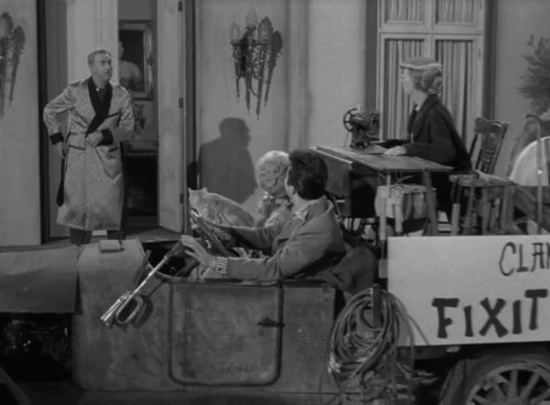 The Beverly Hillbillies - The Big Bank Battle - Clampett family Jed Buddy Ebsen, Granny Irene Ryan, Elly May Donna Douglas and Jethro Max Baer Jr. in truck in front of Mr. Drysdale's Raymond Bailey house with ginger tabby cat Rusty Orangey