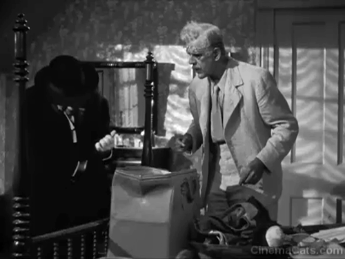 The Boogie Man Will Get You - Siamese kitten being taken out of pocket by Dr. Arthur Lorencz Peter Lorre with Dr. Billings Boris Karloff animated gif