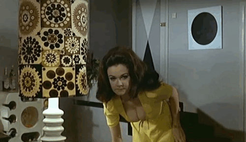 Carry On Loving - Jennuy Imogen Hassall picking up black cat Cooking Fat from sofa with Terence Philpot Terry Scott animated gif