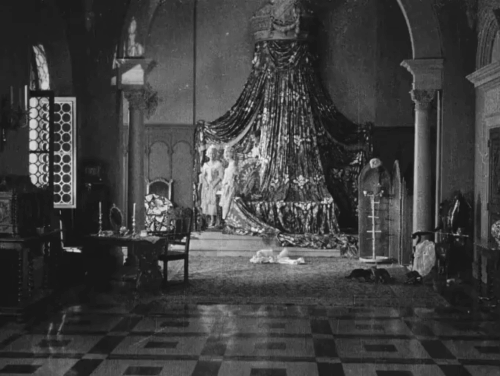 Casanova - Casanova Ivan Mosjoukine with ladies in waiting and three black kittens playing on floor animated gif