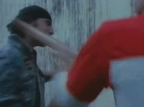 U.S. Catman Lethal Track - men fighting in front of tuxedo cat in cage with Sam Jonathan James getting scratched animated gif