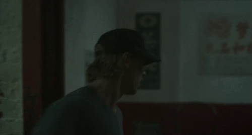 Caught Stealing - Hank Austin Butler watches longhair brown tabby cat Bud Tonic limp into hallway animated gif