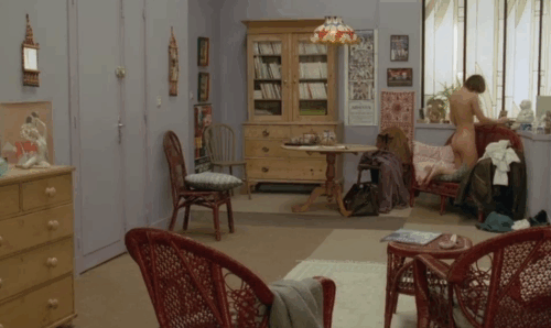 Le Choc - The Shock - Terrier Christian Alain Delon bursting into room and taking gray cat Soudan from naked man in bed with Mathilde Catherine Leprince animated gif