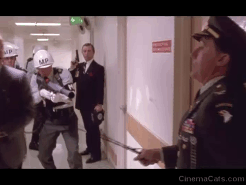 C.H.U.D. II: Bud the Chud - black cat jumping out of closet at Colonel Masters Robert Vaughn animated gif