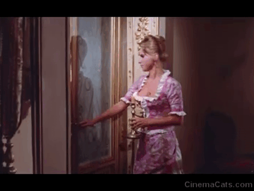 Count Dracula's Great Love - Marlene Ingrid Garbo startled by black cat jumping out from door and running down hall animated gif