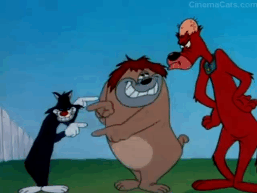 The Counterfeit Cat - black cat and bulldog moving dog's ears from head to head animated gif
