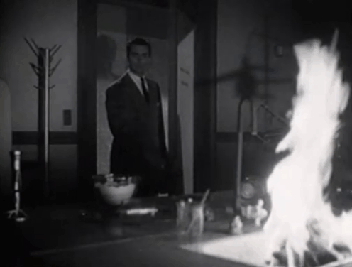 The Creeper - Dr. Reade John Baragray running into laboratory on fire and finding body of body of Gwen lying on laboratory floor surrounded by numerous cats animated gif