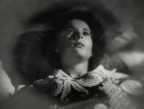 The Creeper - Nora Janis Wilson imagining black and tabby cats all around her animated gif