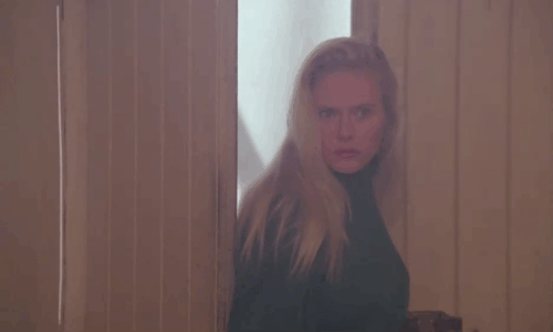 Demonia - Liza Meg Register being startled by cats as she enters house animated gif