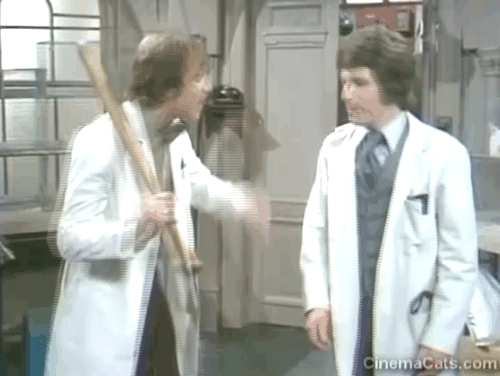 Doctor in Charge - A Man's Best Friend is his Cat - Duncan Robin Nedwell and Paul George Layton arguing as brown tabby cat Thomas leaves room animated gif