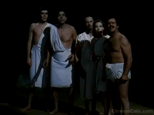 Dr. Cyclops - black cat Satanas meowing at shrunken people animated gif