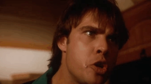 Dust Devil - close up of tuxedo cat as Mark Rufus Swart slaps Wendy Chelsea Field animated gif