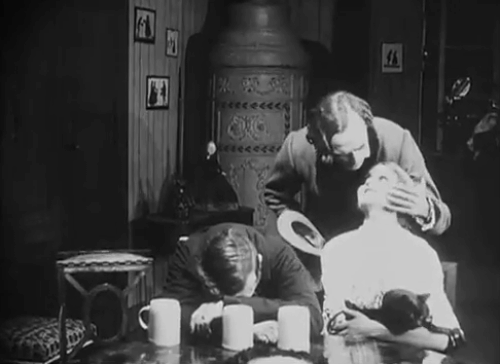 Eerie Tales - Unheimliche Geschichten - Conrad Veidt being affectionate with Anita Berber holding black cat angering drunk Reinhold Schunzel animated gif