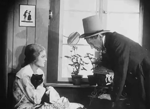 Eerie Tales - Unheimliche Geschichten - Anita Berber holding black cat as drunk Reinhold Schunzel tries to hit her animated gif