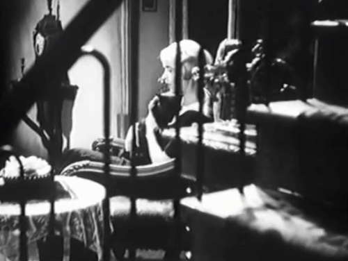 Eerie Tales - Unheimliche Geschichten - Betty Roma Bahn picking up black cat and carrying him over shoulder animated gif