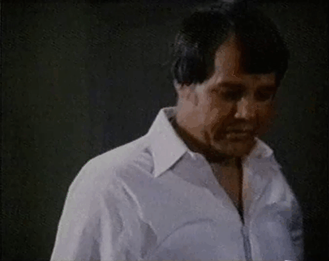 Eischied - Only the Pretty Girls Die - Joe Don Baker watching ginger and white tabby cat P.C. Waldo Kitty run into other room animated gif