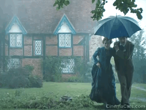 The Electrical Life of Louis Wain - Louis Benedict Cumberbatch and Emily Claire Foy finding tuxedo kitten Peter in the rain animated gif
