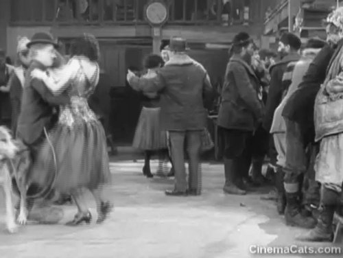 The Gold Rush - small tabby cat on dance floor with dog tied to Charlie Chaplin animated gif
