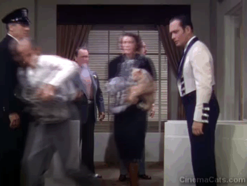 The Goldwyn Follies - people carrying cats from Merlin Adolph Menjou office animated gif