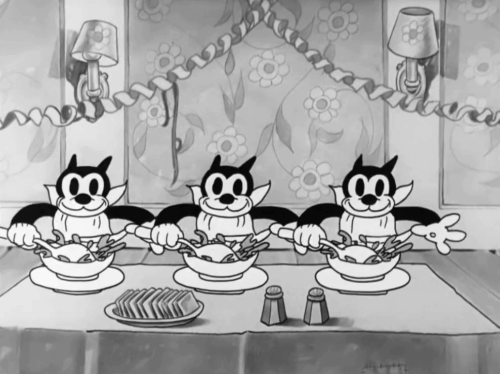 Goopy Geer - three cartoon black cats slurping from soup bowls animated gif