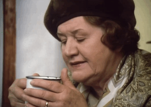 Hetty Wainthropp Investigates - black cat behind curtains on windowsill