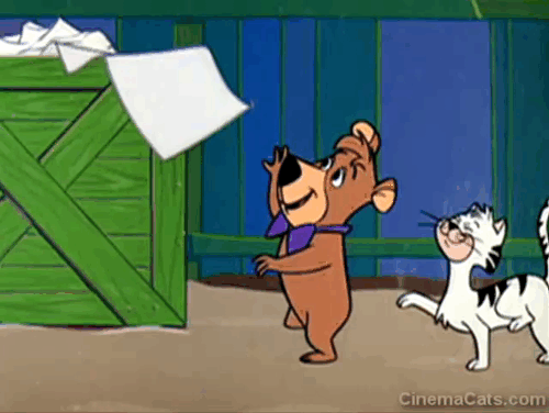 Hey There, It's Yogi Bear - Boo Boo donning paper hat while marching with cat animated gif