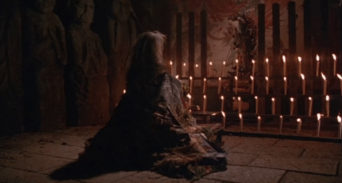 The House Where Evil Dwells - old witch Tsuyako Okajima with black cat in arms animated gif