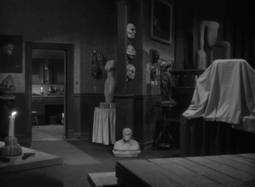 House of Horrors - Marcel Martin Kosleck walking with tray followed by grey tabby cat Pietro animated gif