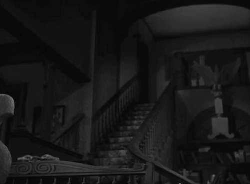 House of Horrors - grey tabby cat Pietro running down stairs as Marcel Martin Kosleck is strangled by the Creeper Rondo Hatton animated gif
