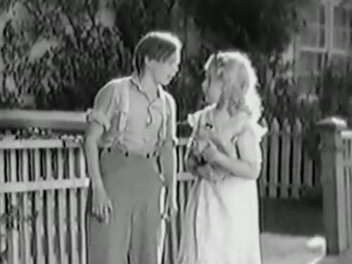 Huckleberry Finn - Tom Sawyer Jackie Coogan yelling at Becky Thatcher Mitzi Green holding small kitten animated gif