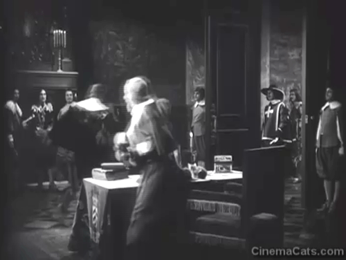 The Iron Mask - Cardinal Richelieu Nigel de Brulier leaving desk and three kittens behind animated gif