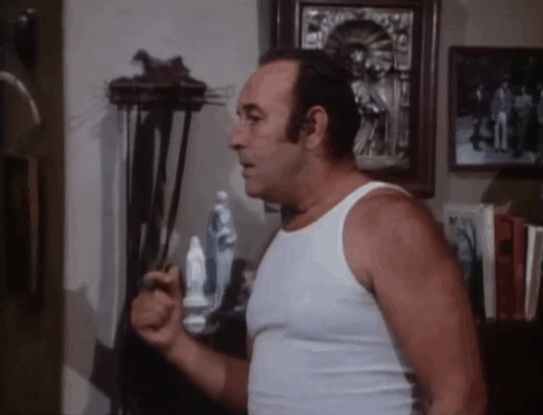 Ironside - The Return of Eleanor - Mr. Farasi Joseph parry looking at ginger tabby cat licking lips animated gif