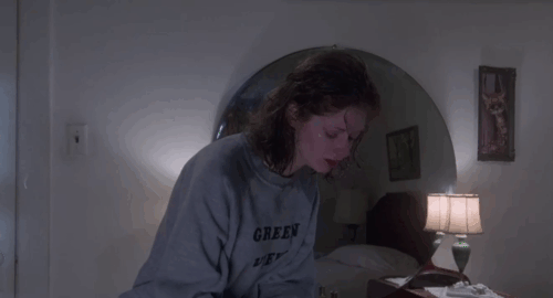 Jennifer - Lisa Pelikan crying while picking up and holding brown tabby kitten animated gif