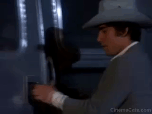 Jinxed! - black cat Angus running through trailer and jumping on Willie Ken Wahl animated gif