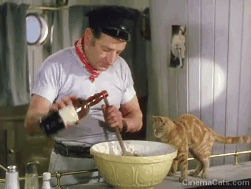 Laughing Anne - Nobby Ronald Shiner stirring bowl of pudding with marmalade tabby cat Ginger animated gif