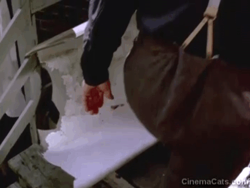 Lies My Father Told Me - black cat eating meat scraps in half of a bathtub animated gif