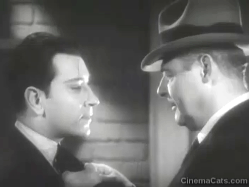 Limehouse Blues - Harry Young George Raft and Inspector Sheridan with tabby kitten biting pants cuff animated gif