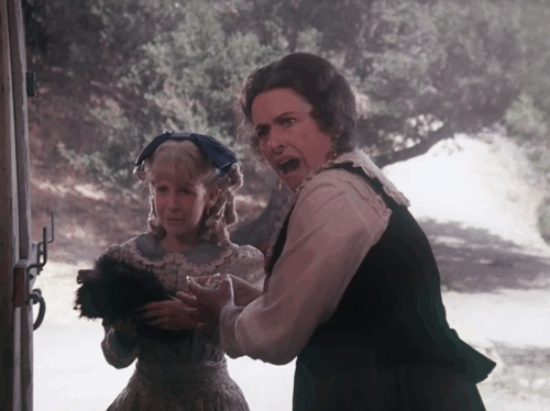 Little House on the Prairie - Gambini, the Great - Willie Jonathan Gilbert covered in black with Nancy Allison Balson holding charred black fur with Harriet Katherine MacGregor and Nels Richard Bull petting black cat Pepper on barrel animated gif