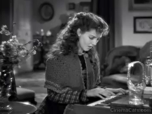 Little Women - Beth Jean Parker playing piano with kittens in basket by pedals animated gif