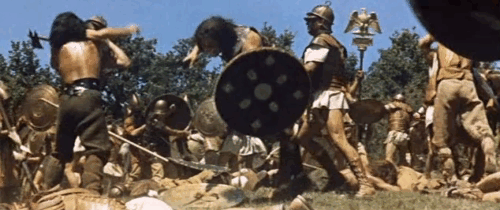 L'ultimo gladiatore - Messalina vs. the Son of Hercules - Caligula Charles Borromel sitting in lectica during battle with cream colored tabby cat animated gif