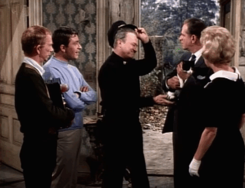 My Favorite Martian - Stop the Presses, I Want to Get Off - Tim Bill Bixby, Uncle Martin Ray Walston, police chief Roy Engel handing tuxedo cat to Detective Brennan Alan Hewitt who is startled when cat roars and Mrs. Brown Pamela Britton animated gif