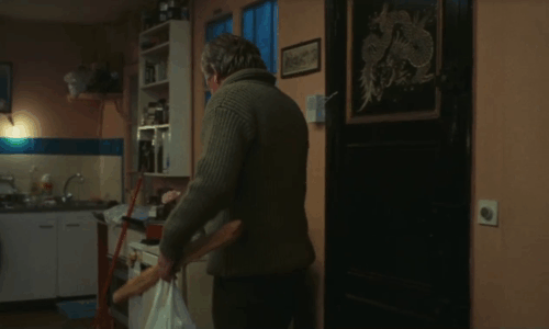 Neige - black cat jumping away from Bruno Paul La Person animated gif