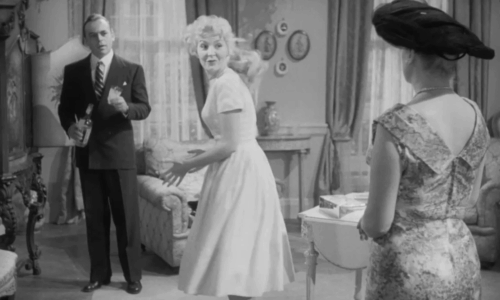 Passport to Shame - Room 43 - Malou Odile Versois talking to Aggie Brenda de Banzie and Biaggi Herbert Lom as tuxedo kitten Mignon plays on chair animated gif