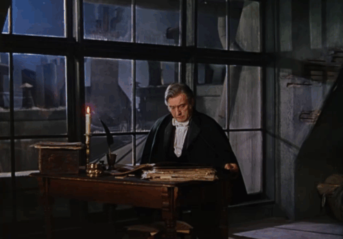 Phantom of the Opera - brown tabby cat jumping down from windowsill behind Erique Claude Rains animated gif