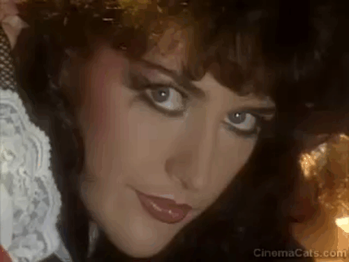 Puss 'n Boots - Adam Ant - woman turns into cat to squeeze into hole animated gif
