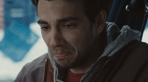 Real Time - Andy Jay Baruchel spotting tuxedo cat Cleo in carrier in back seat of car animated gif
